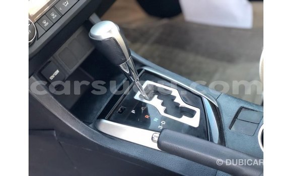 Sayi Imported Toyota Corolla White Mota in Import - Dubai a Burkina Faso Sayi Imported Toyota Corolla White Mota in Import - Dubai a Burkina Faso