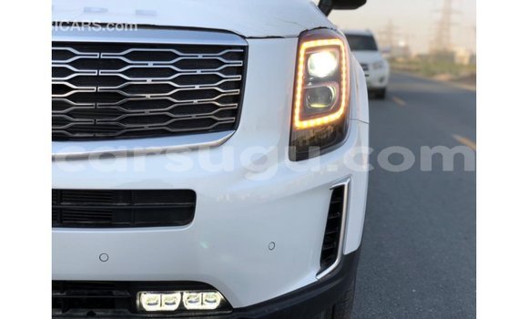 Sayi Imported Kia Carens White Mota in Import - Dubai a Burkina Faso Sayi Imported Kia Carens White Mota in Import - Dubai a Burkina Faso