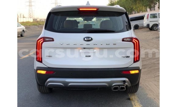Sayi Imported Kia Carens White Mota in Import - Dubai a Burkina Faso Sayi Imported Kia Carens White Mota in Import - Dubai a Burkina Faso