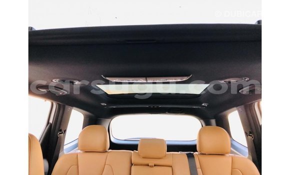 Sayi Imported Kia Carens White Mota in Import - Dubai a Burkina Faso Sayi Imported Kia Carens White Mota in Import - Dubai a Burkina Faso