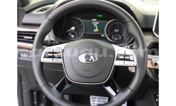 Sayi Imported Kia Carens White Mota in Import - Dubai a Burkina Faso Sayi Imported Kia Carens White Mota in Import - Dubai a Burkina Faso