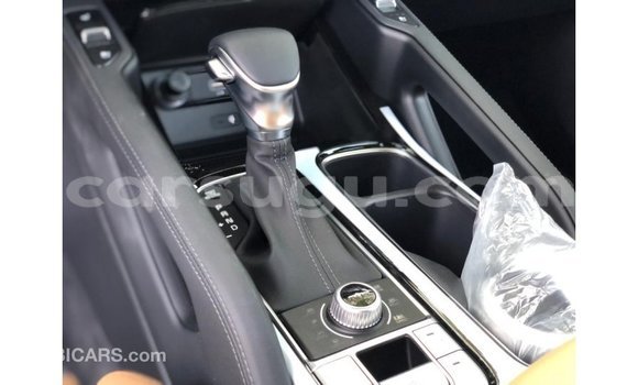 Sayi Imported Kia Carens White Mota in Import - Dubai a Burkina Faso Sayi Imported Kia Carens White Mota in Import - Dubai a Burkina Faso