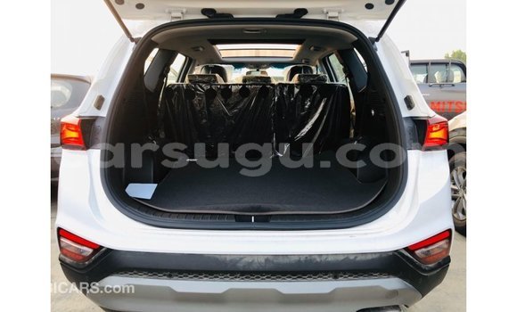 Sayi Imported Hyundai Santa Fe White Mota in Import - Dubai a Burkina Faso Sayi Imported Hyundai Santa Fe White Mota in Import - Dubai a Burkina Faso