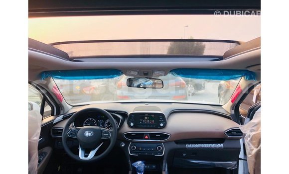 Sayi Imported Hyundai Santa Fe White Mota in Import - Dubai a Burkina Faso Sayi Imported Hyundai Santa Fe White Mota in Import - Dubai a Burkina Faso