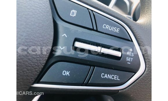 Sayi Imported Hyundai Santa Fe White Mota in Import - Dubai a Burkina Faso Sayi Imported Hyundai Santa Fe White Mota in Import - Dubai a Burkina Faso