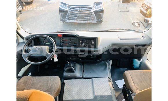 Sayi Imported Toyota Coaster White Mota in Import - Dubai a Burkina Faso Sayi Imported Toyota Coaster White Mota in Import - Dubai a Burkina Faso