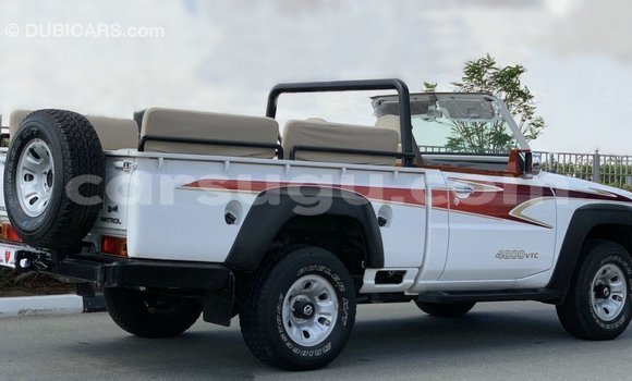 Sayi Imported Nissan Patrol White Mota in Import - Dubai a Burkina Faso Sayi Imported Nissan Patrol White Mota in Import - Dubai a Burkina Faso