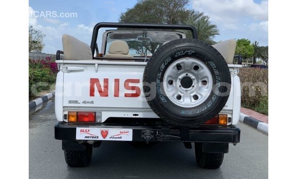 Sayi Imported Nissan Patrol White Mota in Import - Dubai a Burkina Faso Sayi Imported Nissan Patrol White Mota in Import - Dubai a Burkina Faso