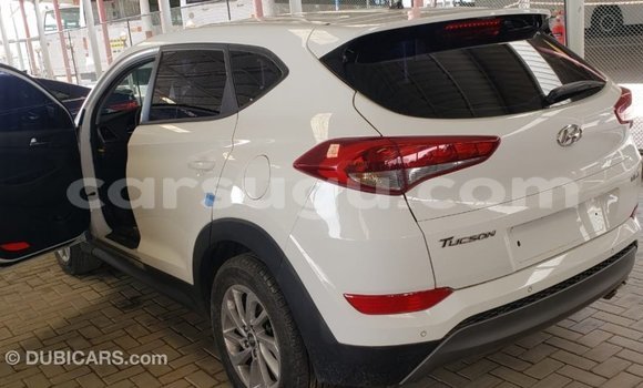 Sayi Imported Hyundai Tucson White Mota in Import - Dubai a Burkina Faso Sayi Imported Hyundai Tucson White Mota in Import - Dubai a Burkina Faso