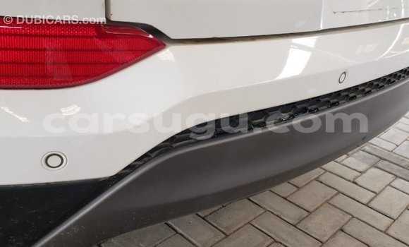 Sayi Imported Hyundai Tucson White Mota in Import - Dubai a Burkina Faso Sayi Imported Hyundai Tucson White Mota in Import - Dubai a Burkina Faso