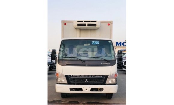 Sayi Imported Mitsubishi Carisma White Mota in Import - Dubai a Burkina Faso Sayi Imported Mitsubishi Carisma White Mota in Import - Dubai a Burkina Faso