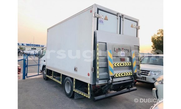 Sayi Imported Mitsubishi Carisma White Mota in Import - Dubai a Burkina Faso Sayi Imported Mitsubishi Carisma White Mota in Import - Dubai a Burkina Faso