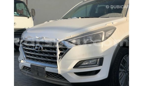 Sayi Imported Hyundai Tucson White Mota in Import - Dubai a Burkina Faso Sayi Imported Hyundai Tucson White Mota in Import - Dubai a Burkina Faso