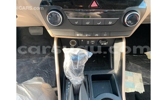 Sayi Imported Hyundai Tucson White Mota in Import - Dubai a Burkina Faso Sayi Imported Hyundai Tucson White Mota in Import - Dubai a Burkina Faso