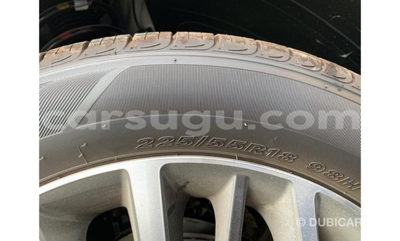 Sayi Imported Hyundai Tucson White Mota in Import - Dubai a Burkina Faso Sayi Imported Hyundai Tucson White Mota in Import - Dubai a Burkina Faso